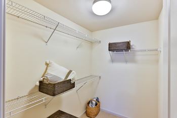 Large walk in closet with wire shelves